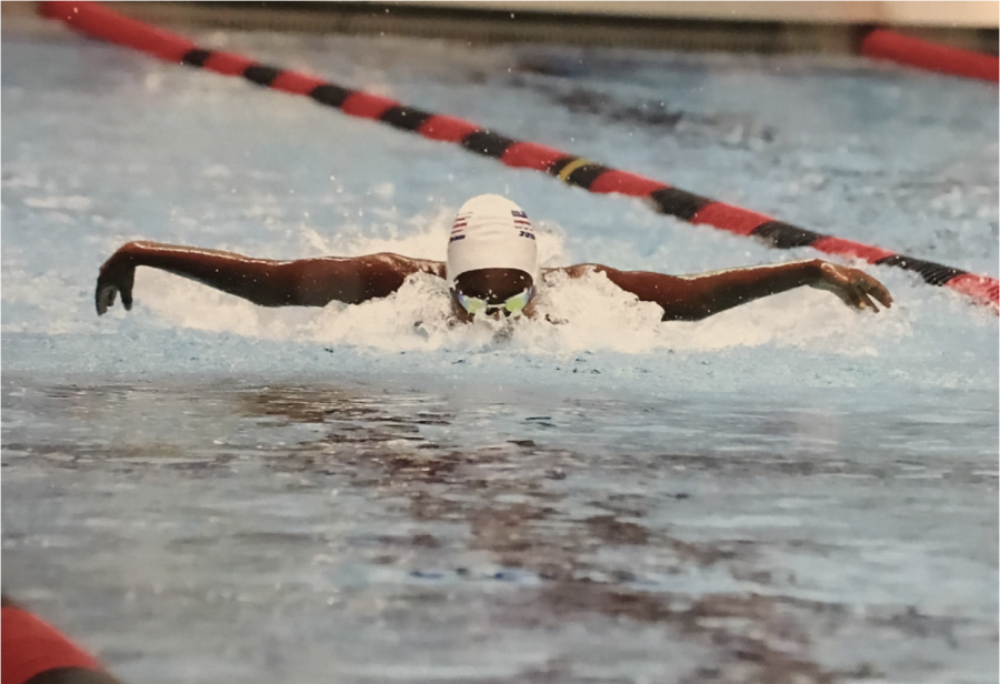 WATER WINGS:Sophomore Hannah Hailu competes in the butterfly during a 2019 meet. Hailu placed 1st in the 100 fly at the Metro Conferences, and she placed 3rd in the 100 fly and 5th in the 100 back at State.