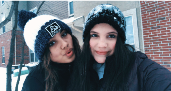 BESTIES FOR THE RESTIES: Gilmond and Ramirez take a selfie together. The two girls connected after they found out they were both immigrants from South America